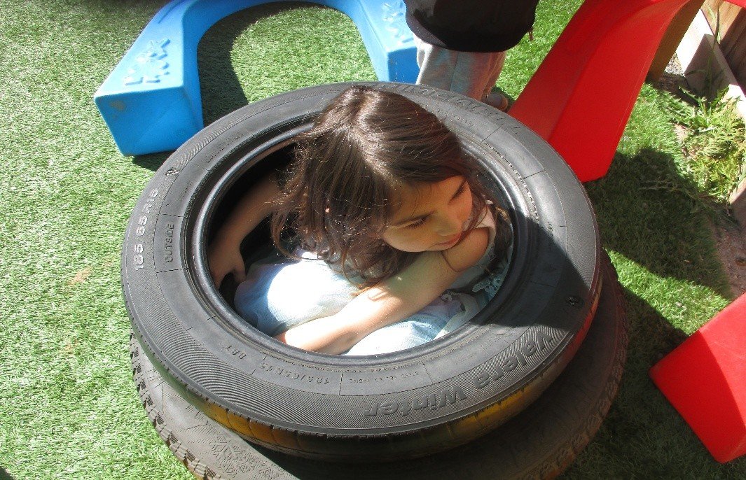 Child in tire